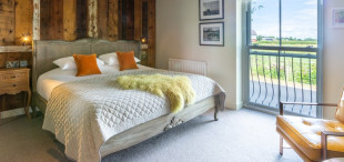 Reclaimed timbers used in B & B bedrooms at the Cartford Inn