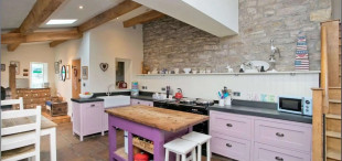 Reclaimed stone and brick for the floor and walls of Provinder House on the Rome Farm estate, Giggleswick, North Yorkshire